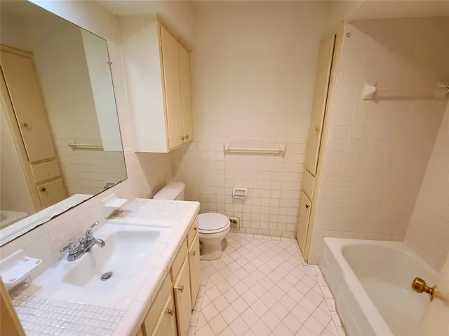 a bathroom with a sink and a tub