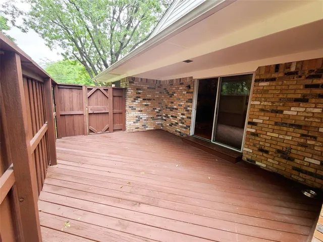 a view of a backyard of the house