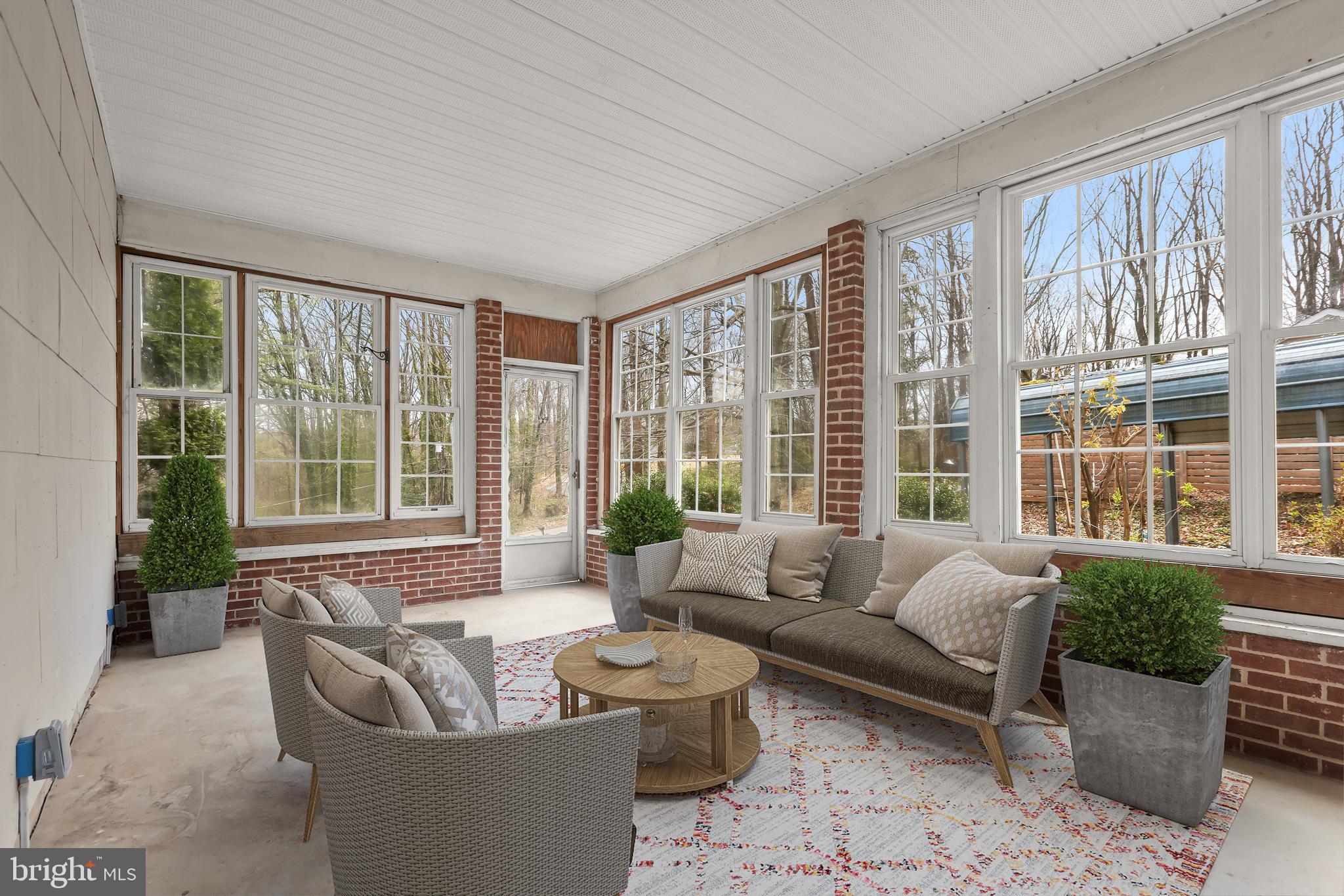 1255 Sheridan Road Crownsville, MD 21032 - Photo 12 of 40 a living room with furniture and large windows