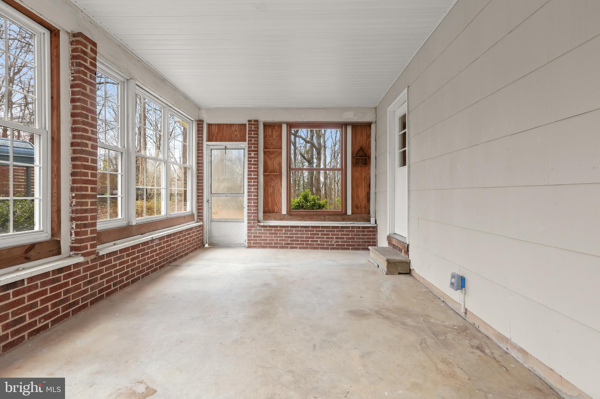 1255 Sheridan Road Crownsville, MD 21032 - Photo 14 of 40 a view of an empty room with a window