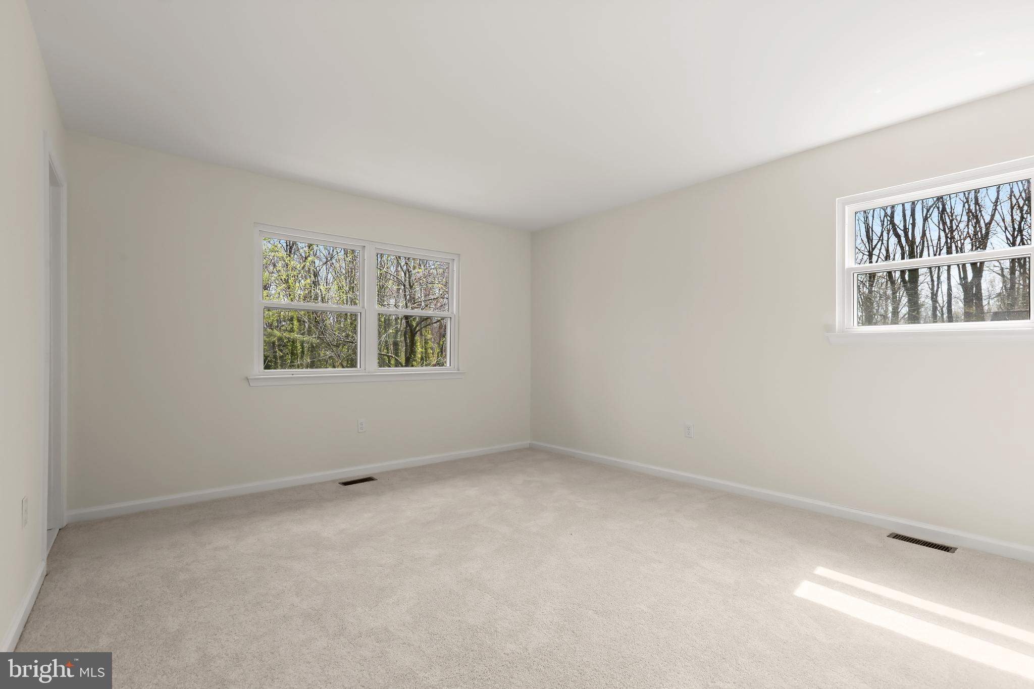 1255 Sheridan Road Crownsville, MD 21032 - Photo 21 of 40 an empty room with windows