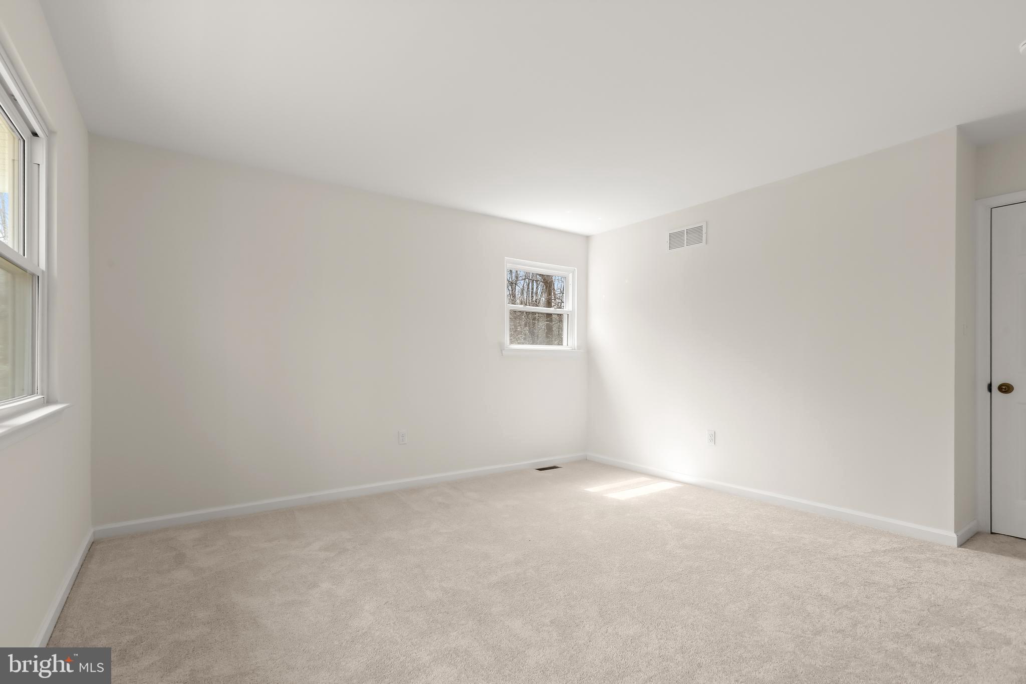 1255 Sheridan Road Crownsville, MD 21032 - Photo 23 of 40 an empty room with windows