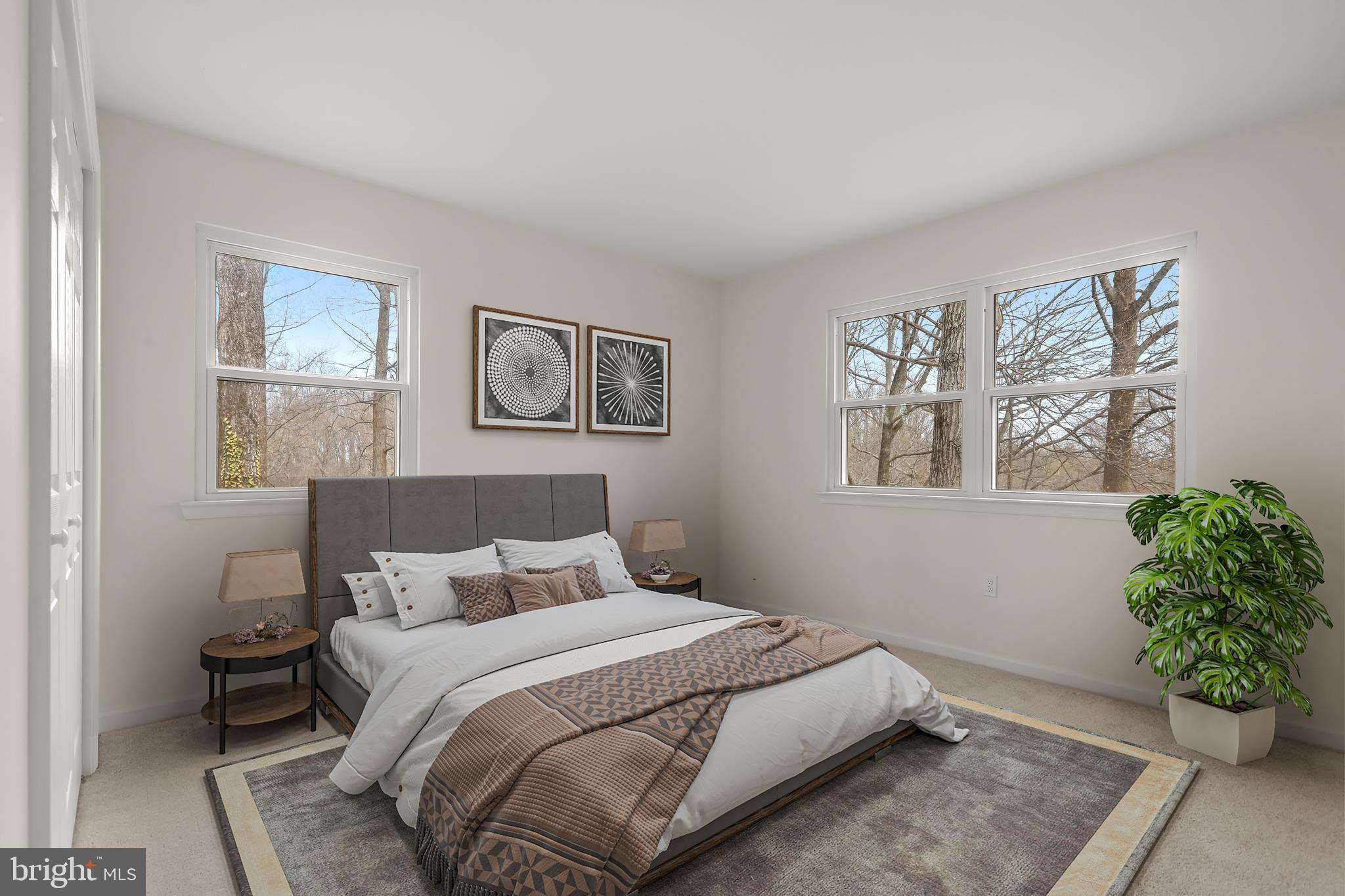 1255 Sheridan Road Crownsville, MD 21032 - Photo 27 of 40 a bedroom with a bed and a painting on the wall