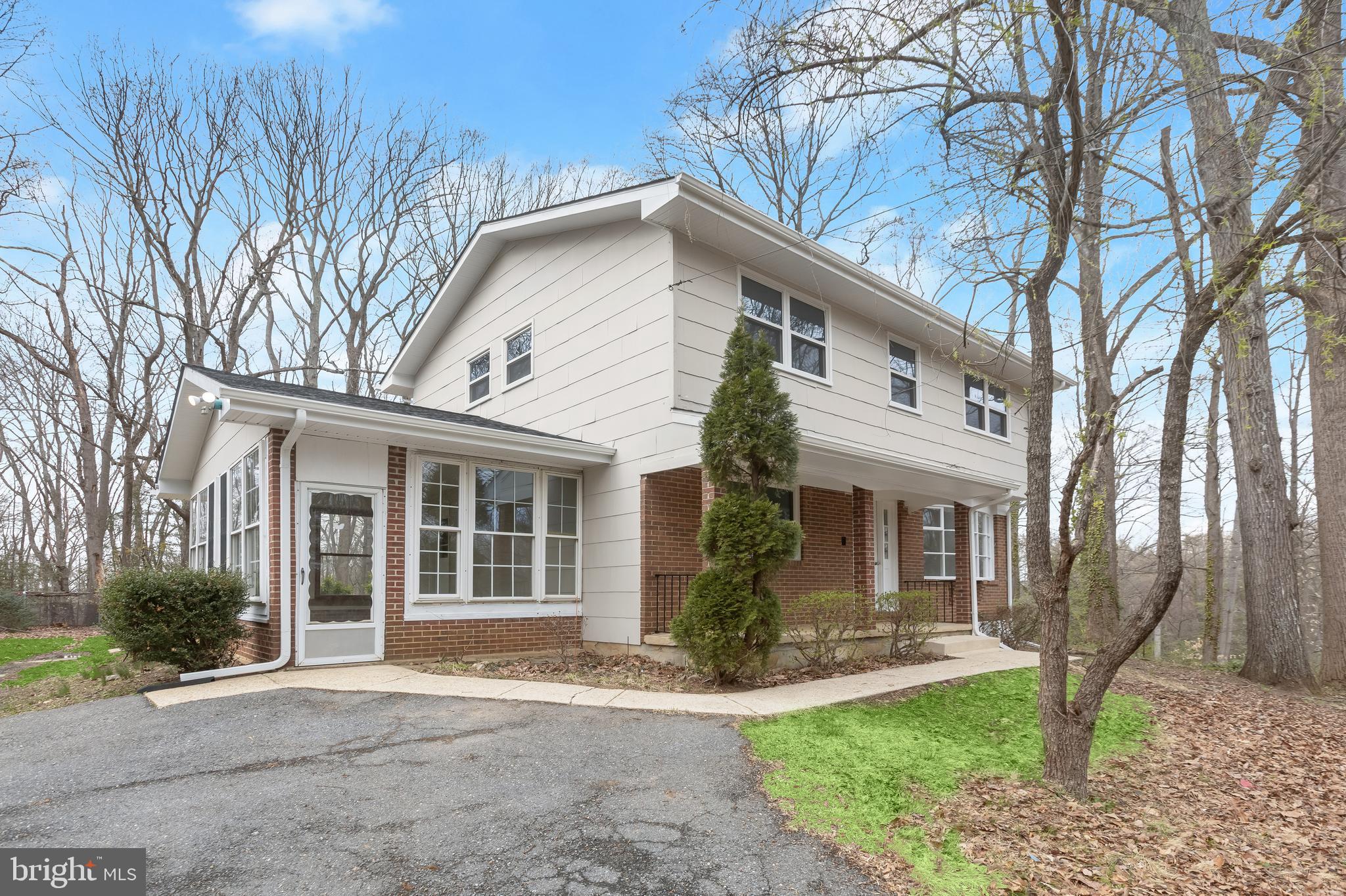 1255 Sheridan Road Crownsville, MD 21032 - Photo 34 of 40 a front view of a house with a yard and porch