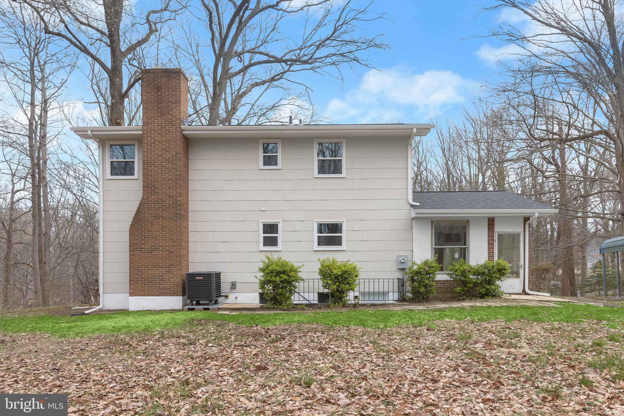 1255 Sheridan Road Crownsville, MD 21032 - Photo 36 of 40 a front view of a house with garden