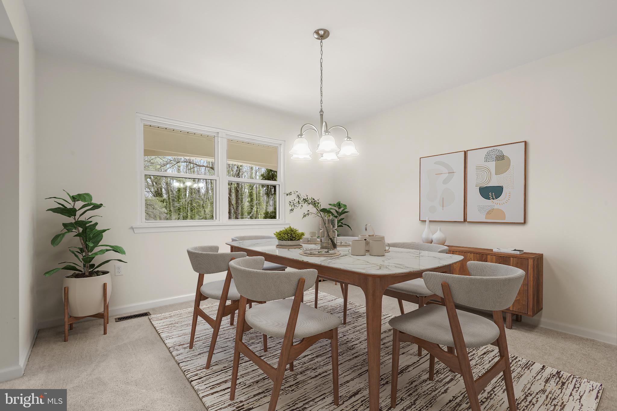 1255 Sheridan Road Crownsville, MD 21032 - Photo 4 of 40 a view of a dining room with furniture window and wooden floor