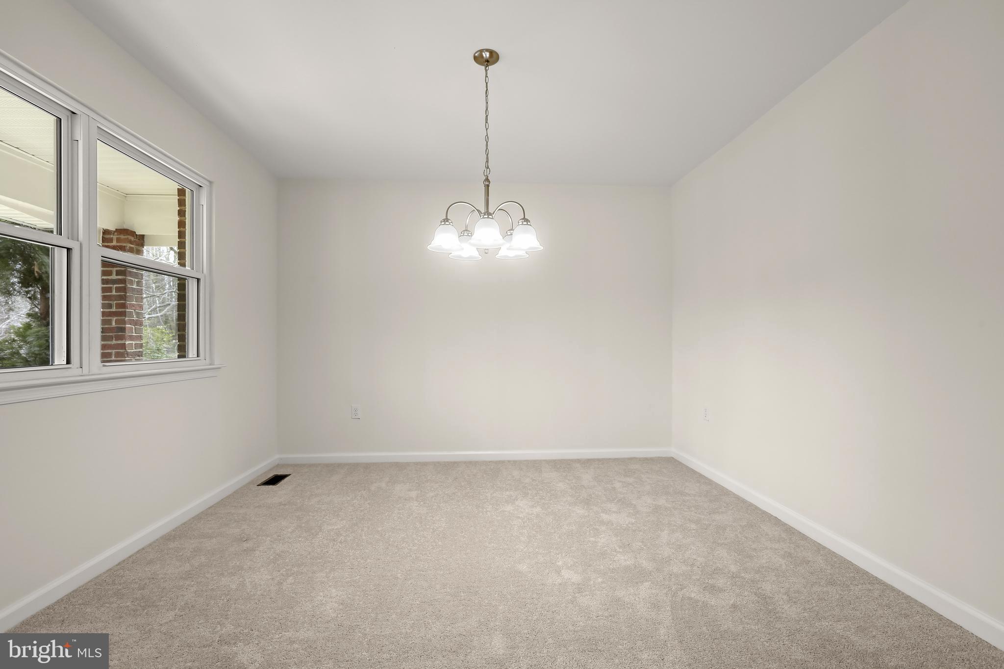 1255 Sheridan Road Crownsville, MD 21032 - Photo 5 of 40 a view of a room with windows and ceiling fan