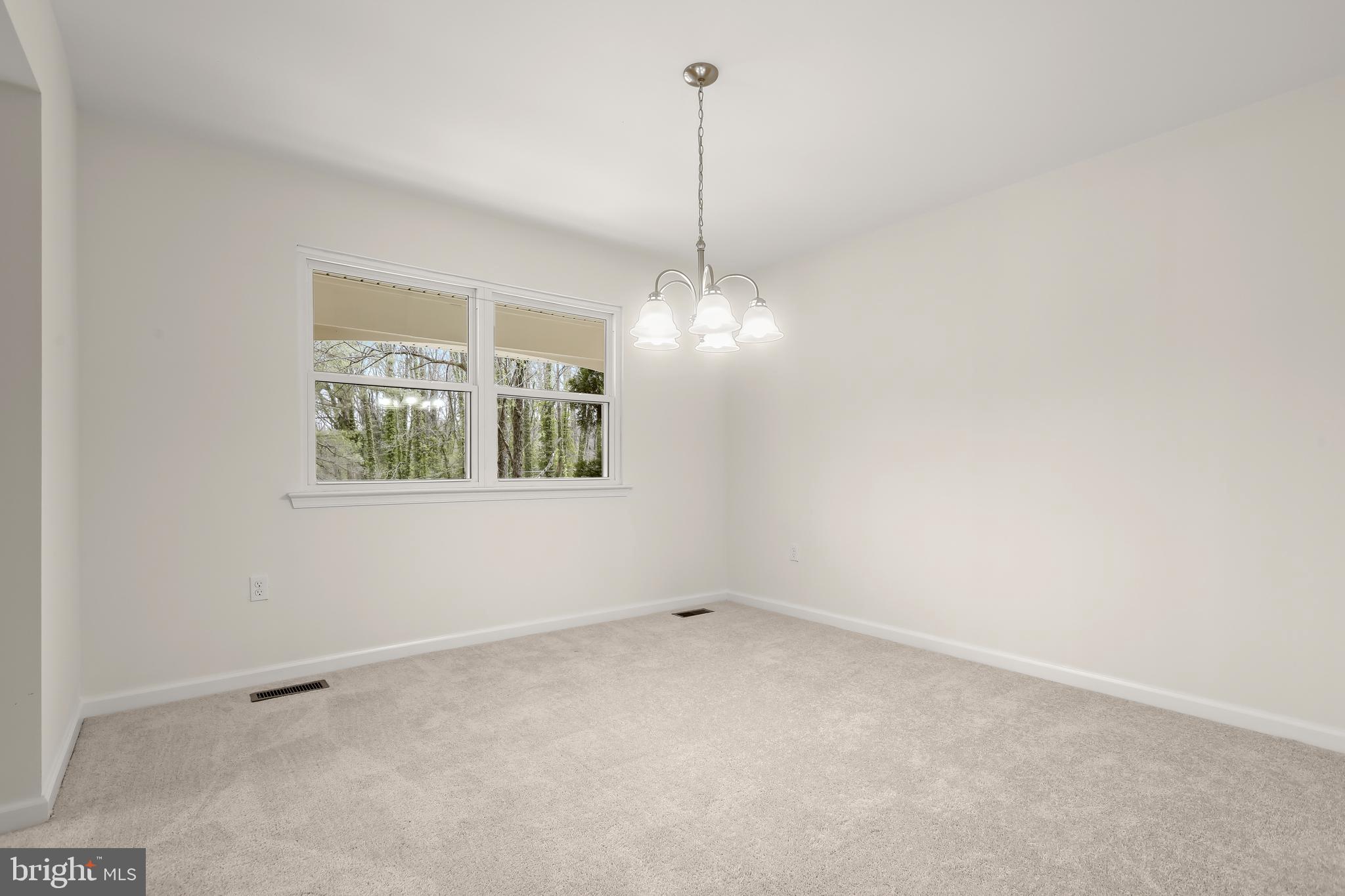 1255 Sheridan Road Crownsville, MD 21032 - Photo 6 of 40 a view of a room that has a window and ceiling fan