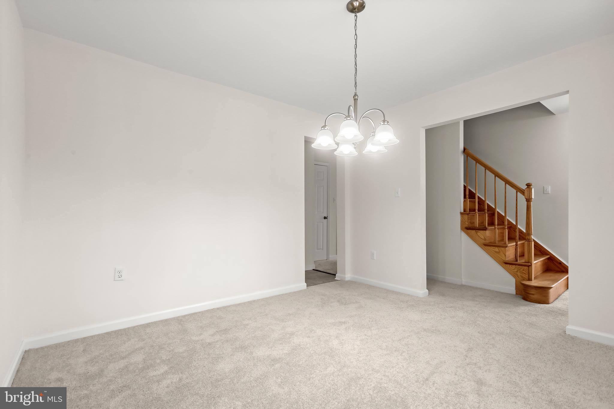 1255 Sheridan Road Crownsville, MD 21032 - Photo 7 of 40 a view of an empty room with stairs