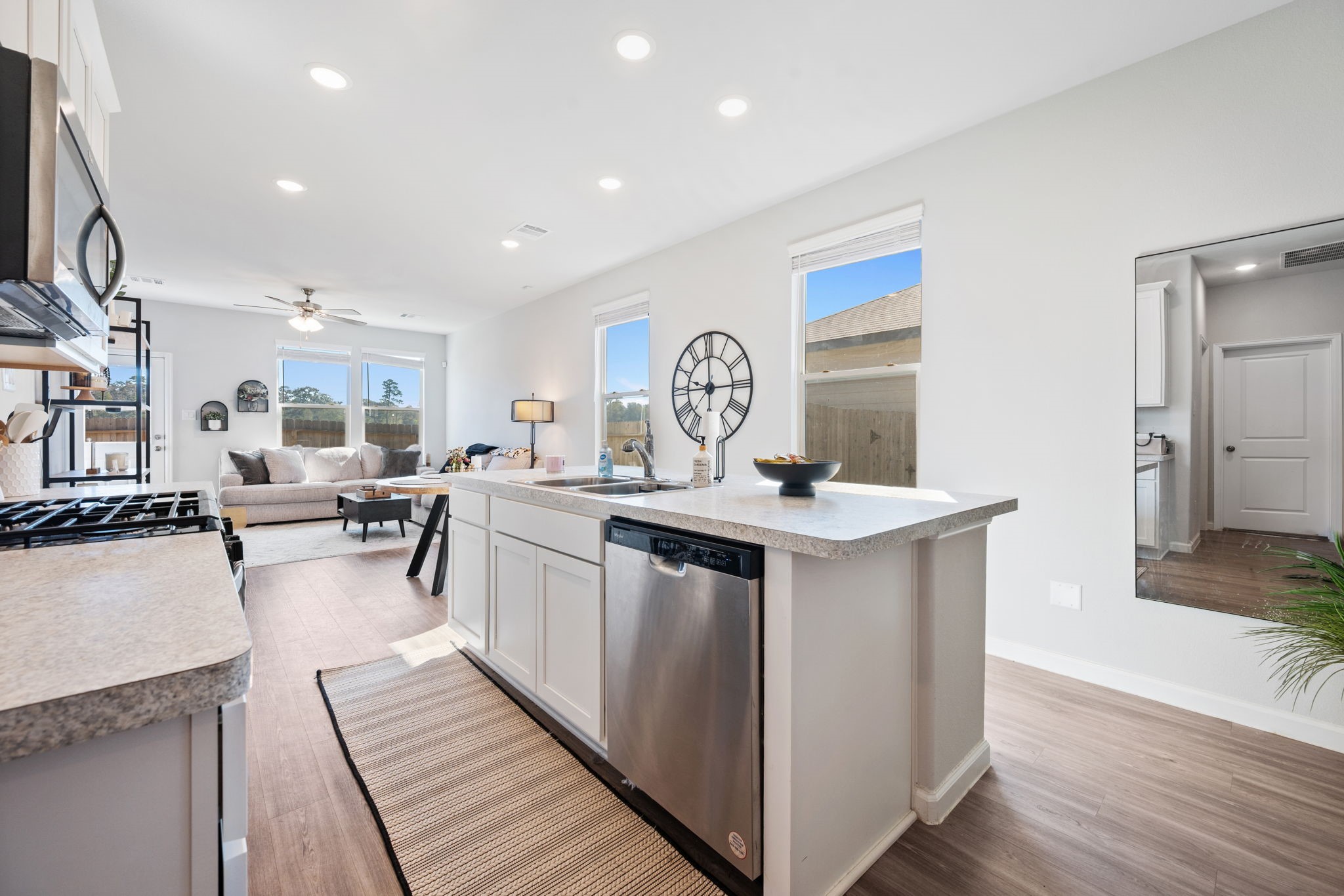 20819 Adventure Way Porter, TX 77365 - Photo 5 of 22 a kitchen with sink stove and cabinets