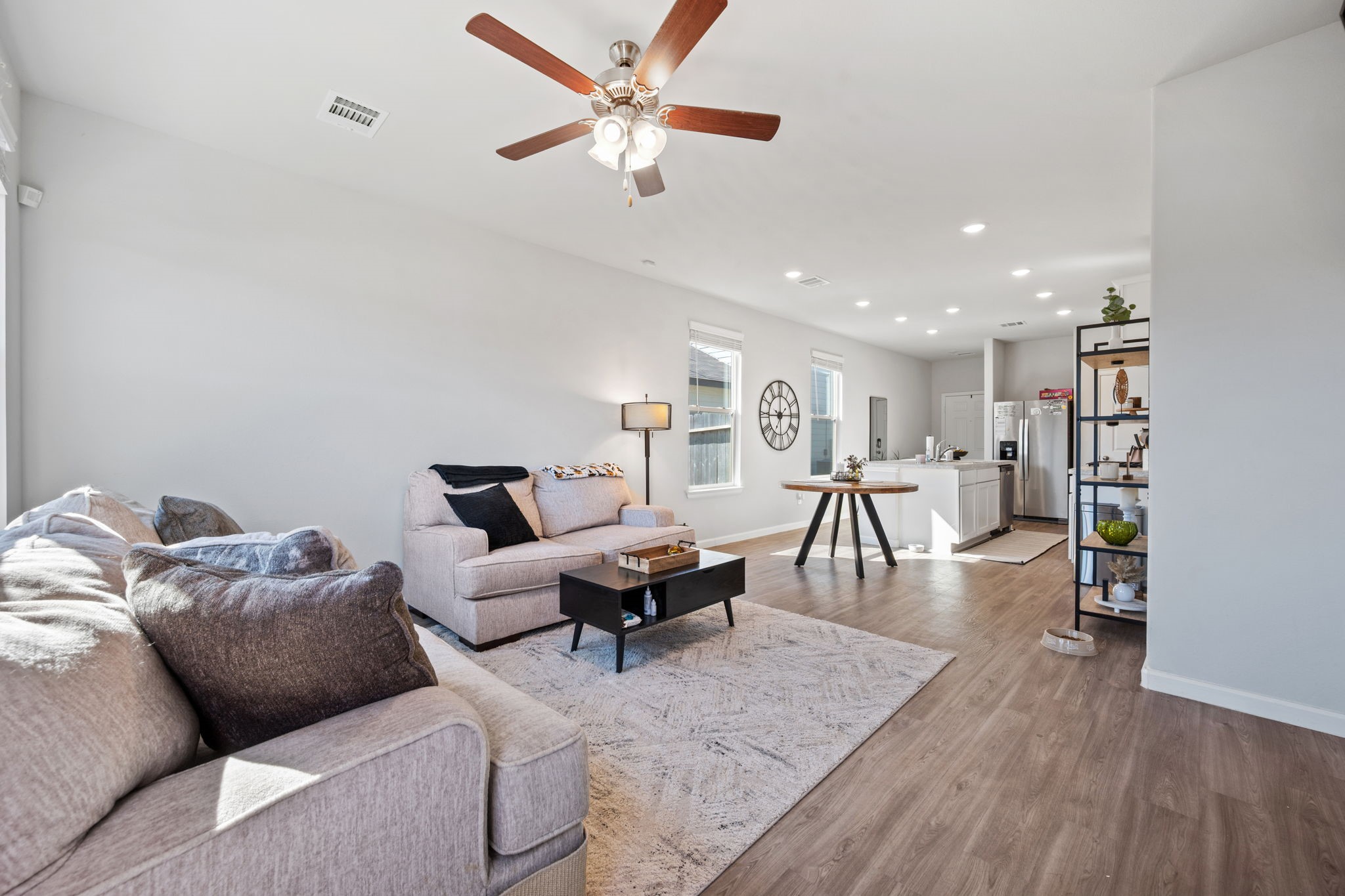 20819 Adventure Way Porter, TX 77365 - Photo 10 of 22 a living room with furniture and a wooden floor