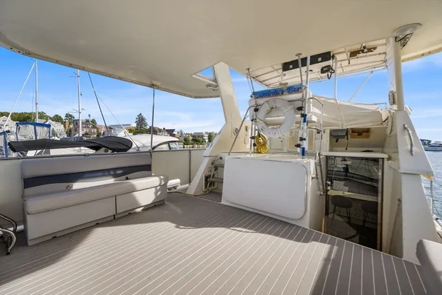 a kitchen view with wooden cabinets and stainless steel appliances
