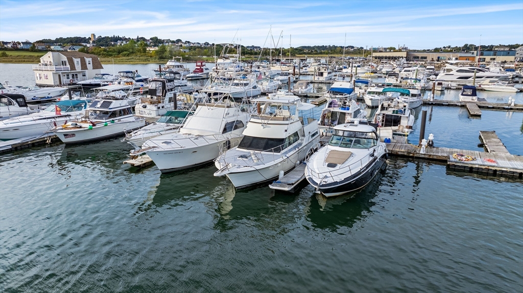 550 Pleasant Street, Unit 11D Winthrop, MA 02152 - Photo 2 of 30 a view of a lake with a mountain view