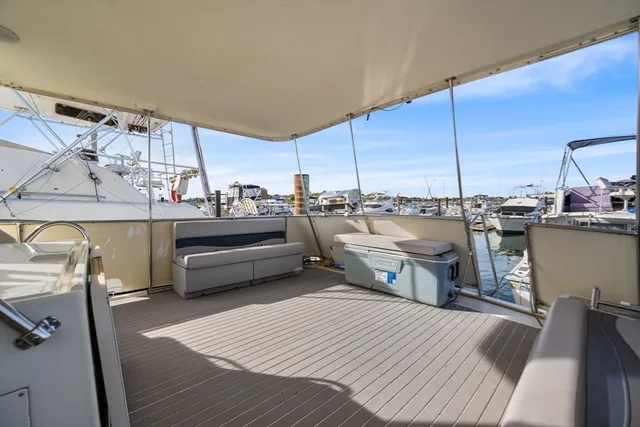 a kitchen with stainless steel appliances wooden cabinets and sink