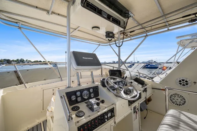 a view of roof deck with furniture