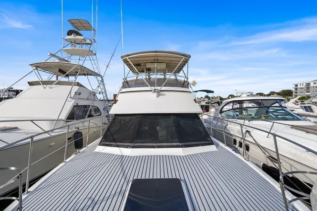a utility room with multiple dryer and washer