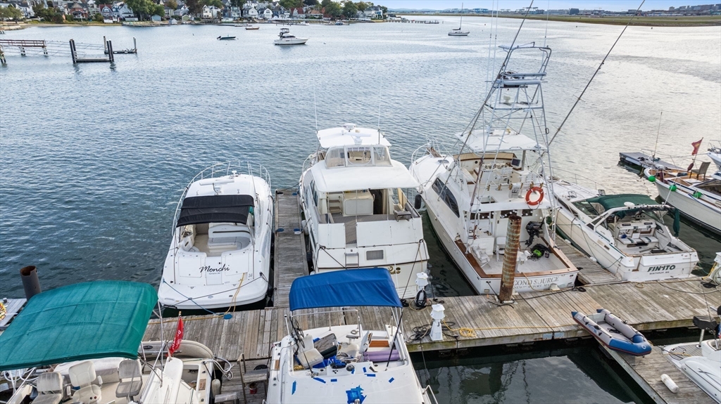 550 Pleasant Street, Unit 11D Winthrop, MA 02152 - Photo 3 of 30 a picture of water view with outdoor seating