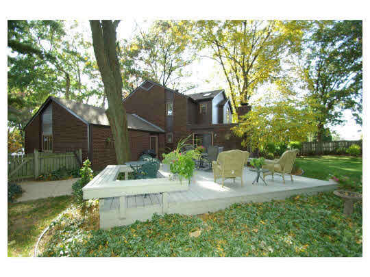 5004 Braewild Road Rockford, IL 61107 - Photo 11 of 11 a view of a house with a yard and sitting area