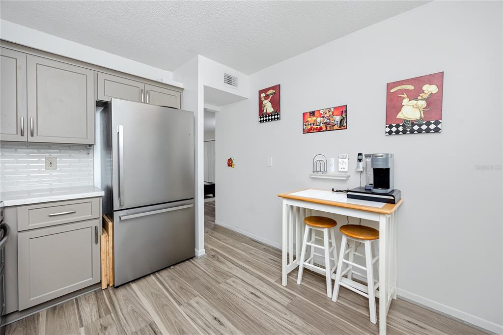 2207 Belleair Road, Unit B30 Clearwater, FL 33764 - Photo 6 of 39 a white refrigerator freezer sitting in a kitchen