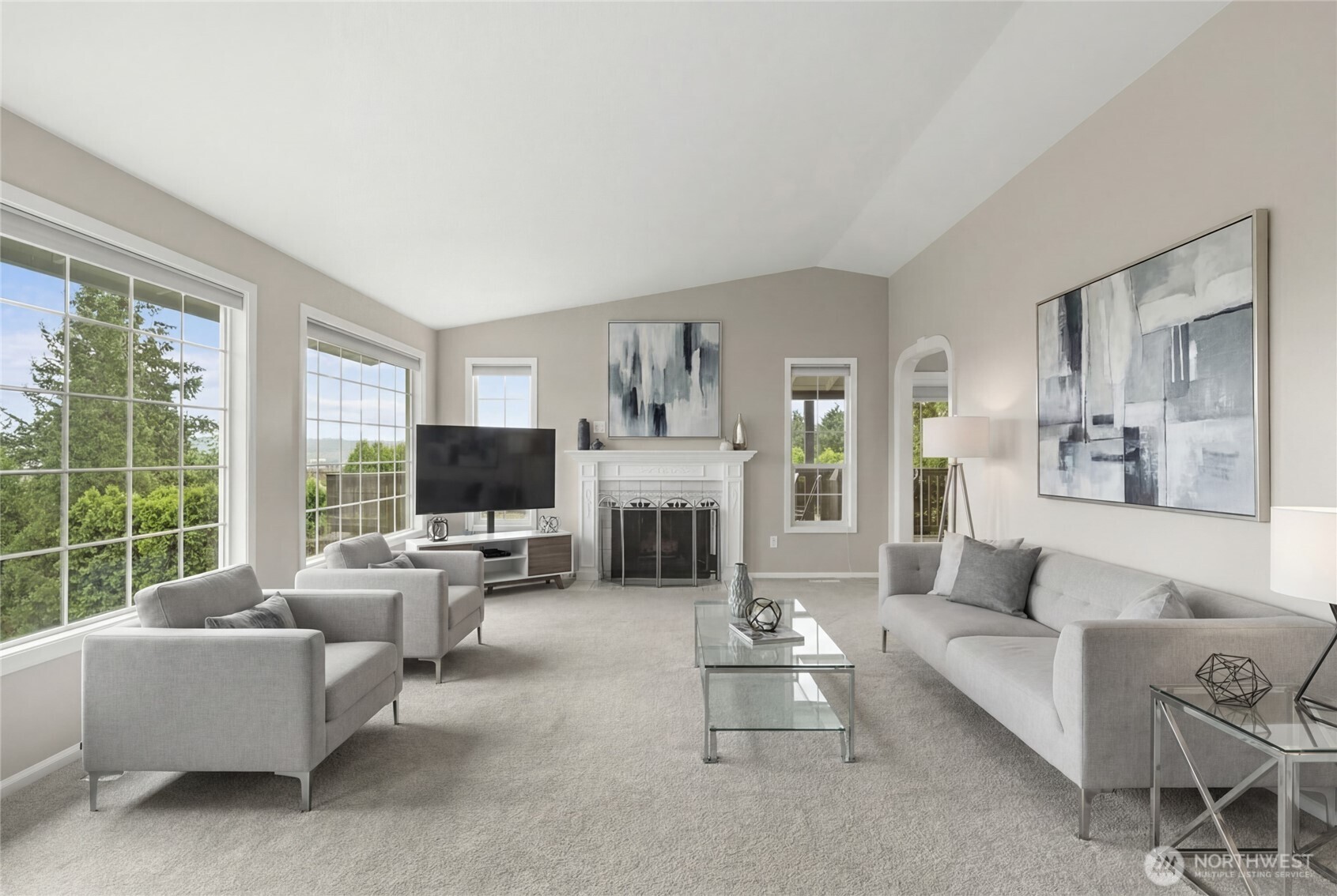 10 Jeffery Place Longview, WA 98632 - Photo 15 of 40 a living room with furniture a fireplace and a flat screen tv