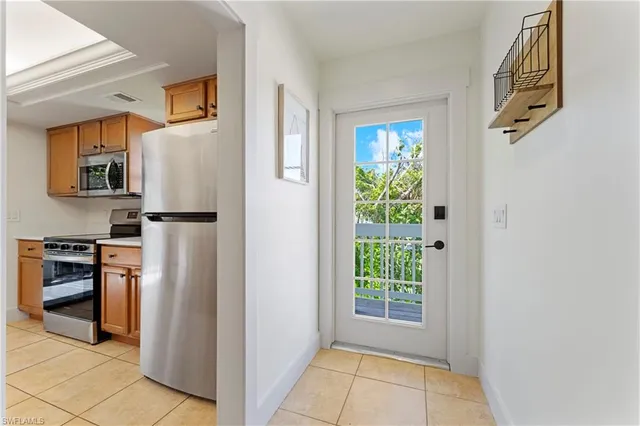 a view of a balcony with wooden floor