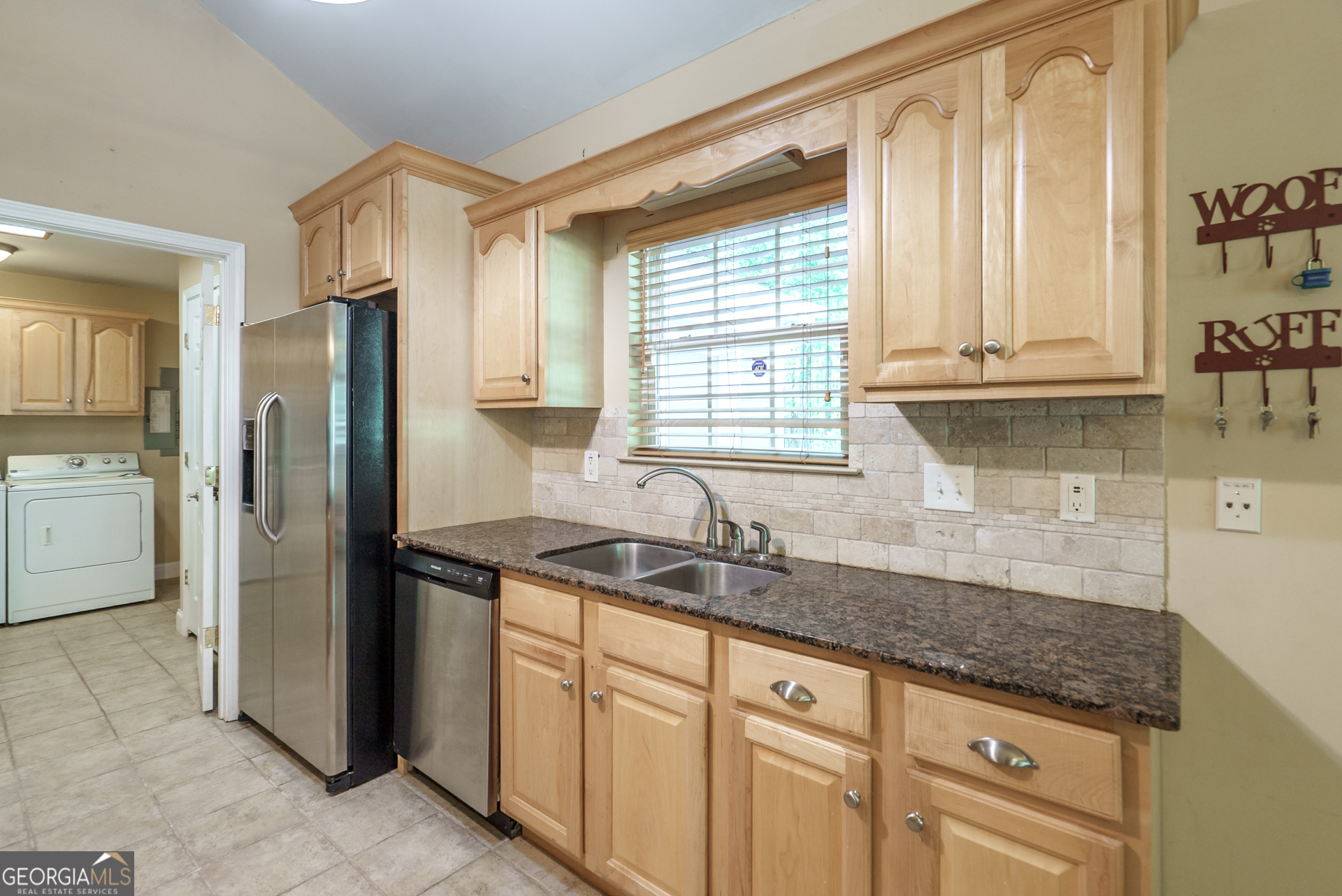 1491 Swords Trail Buckhead, GA 30625 - Photo 19 of 52 a kitchen with granite countertop a sink stainless steel appliances and cabinets