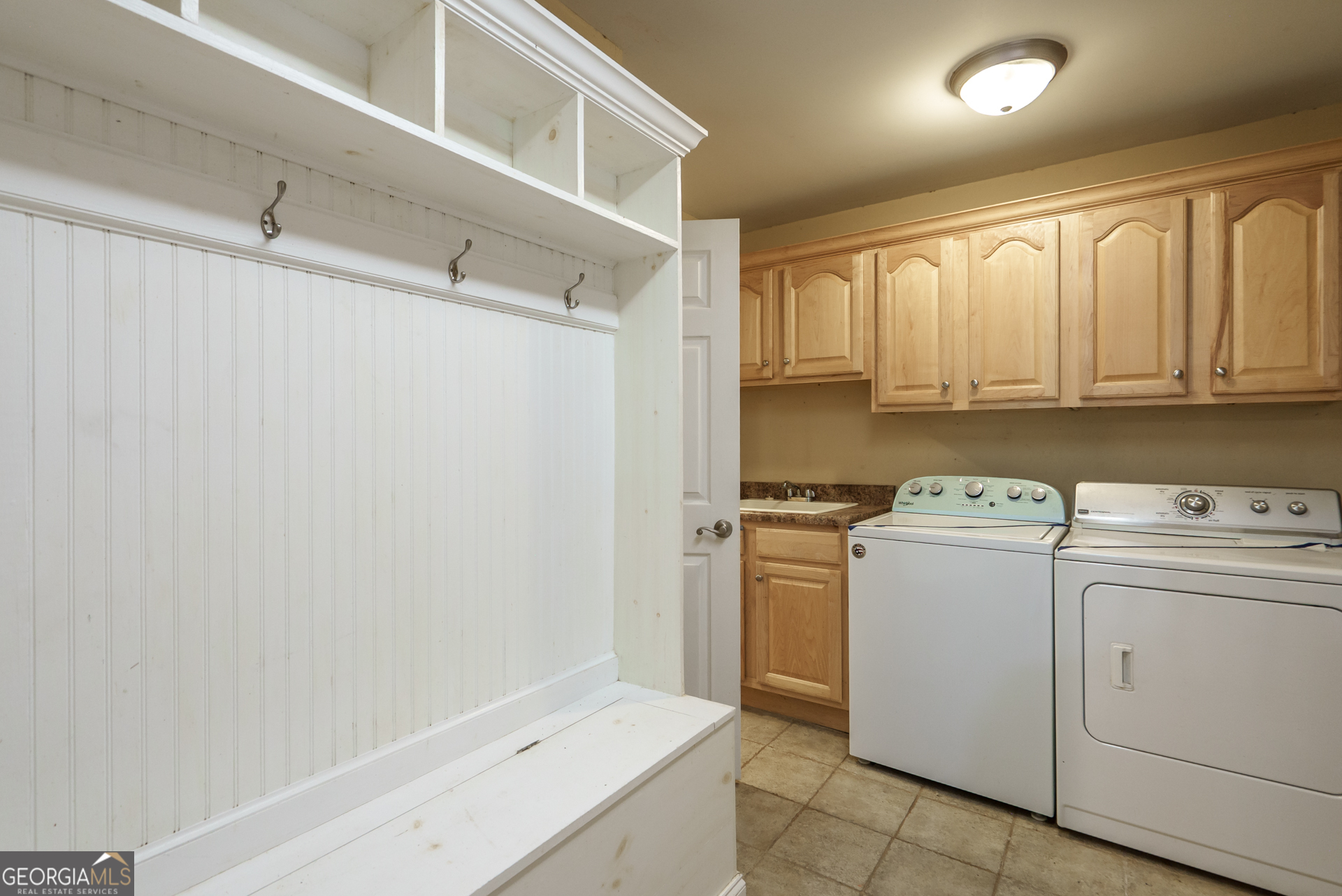 1491 Swords Trail Buckhead, GA 30625 - Photo 21 of 52 a view of storage and utility room with washer and dryer