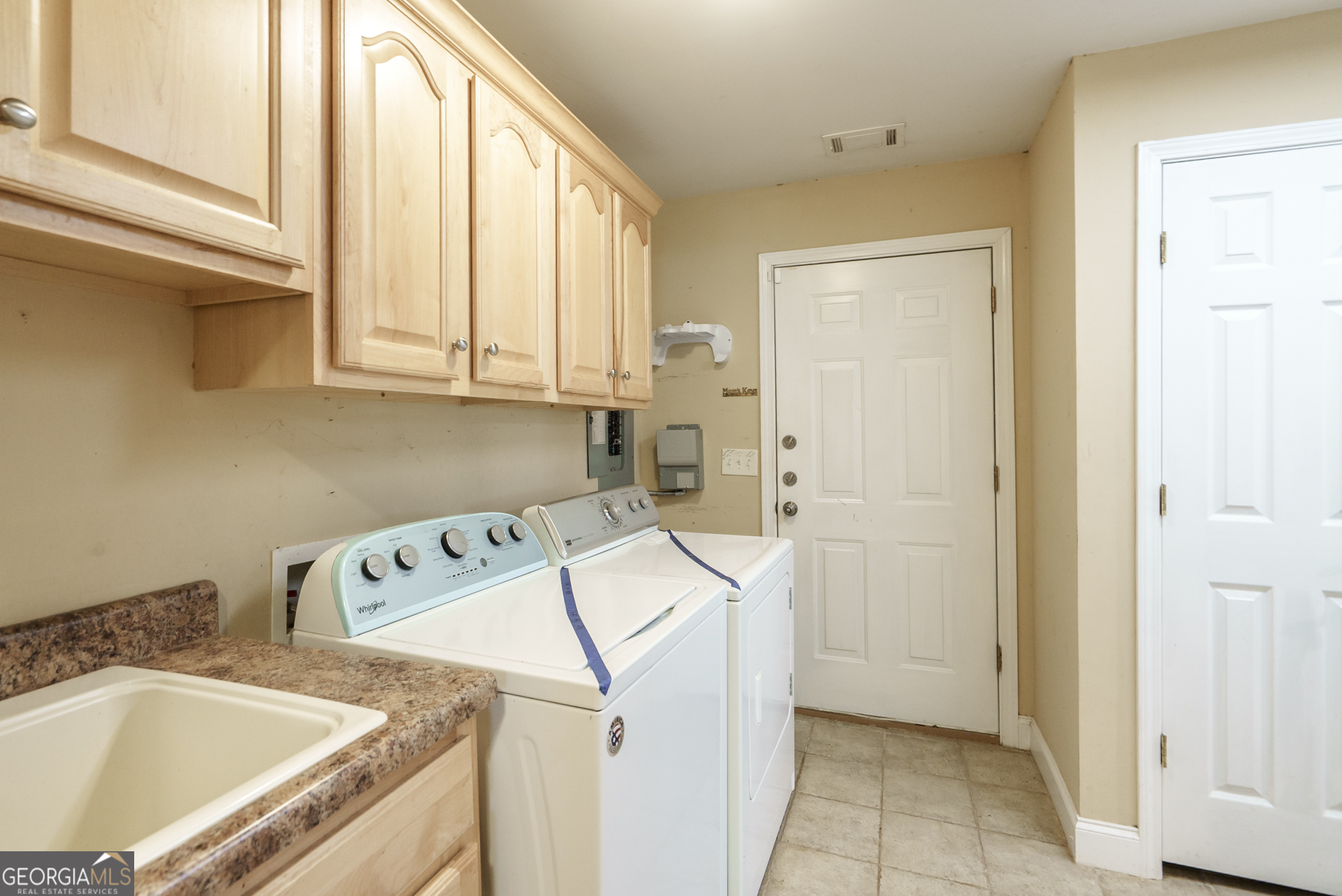 1491 Swords Trail Buckhead, GA 30625 - Photo 23 of 52 a utility room with dryer and washer