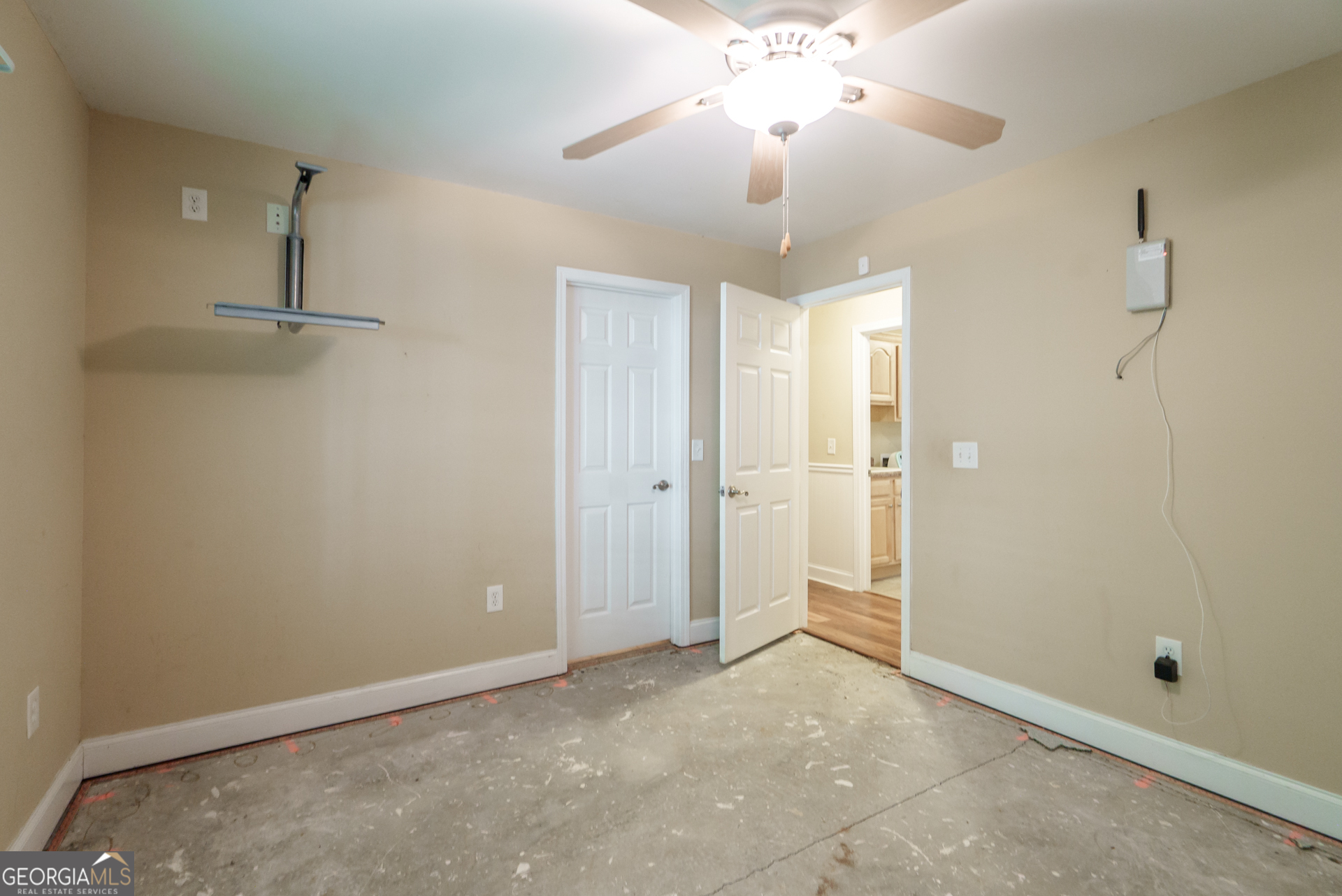 1491 Swords Trail Buckhead, GA 30625 - Photo 25 of 52 a view of an empty room and chandelier fan