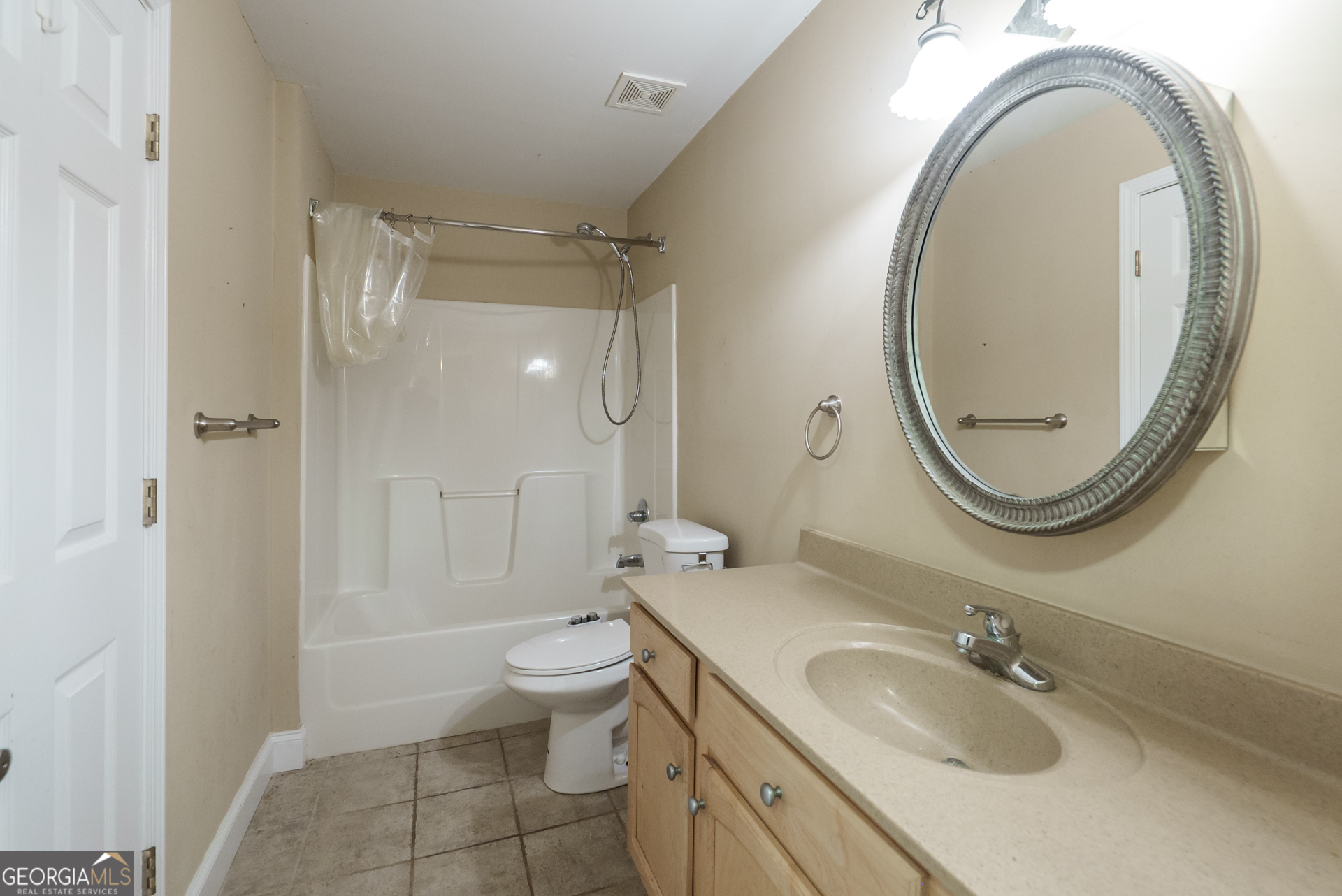 1491 Swords Trail Buckhead, GA 30625 - Photo 26 of 52 a bathroom with a granite countertop toilet a sink and a mirror