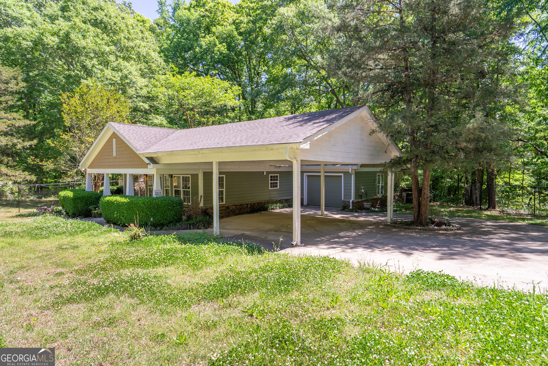 1491 Swords Trail Buckhead, GA 30625 - Photo 4 of 52 a view of a house with a yard and large tree