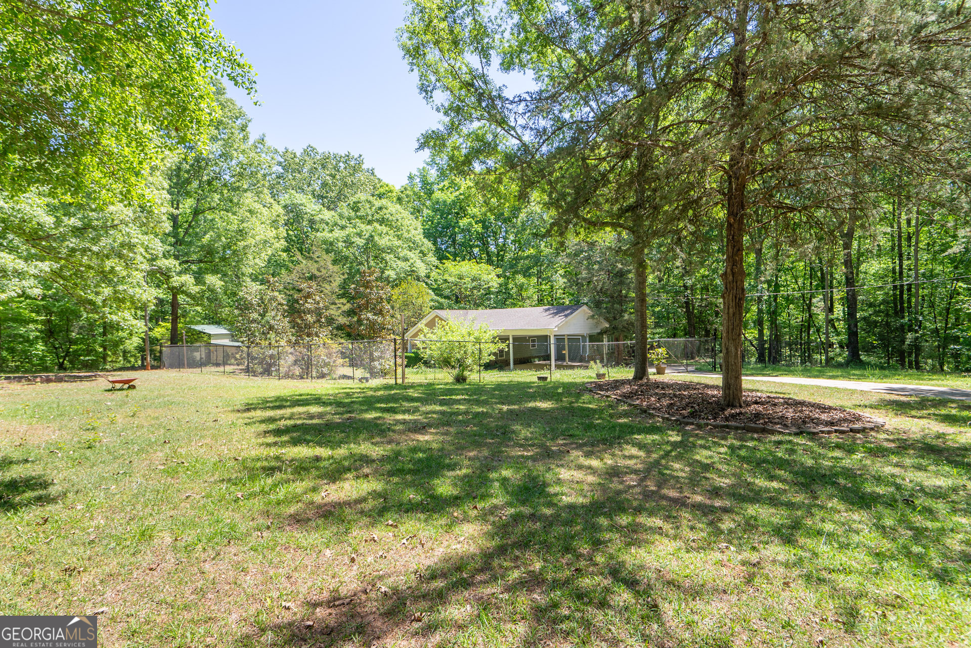 1491 Swords Trail Buckhead, GA 30625 - Photo 43 of 52 a view of a backyard with large trees