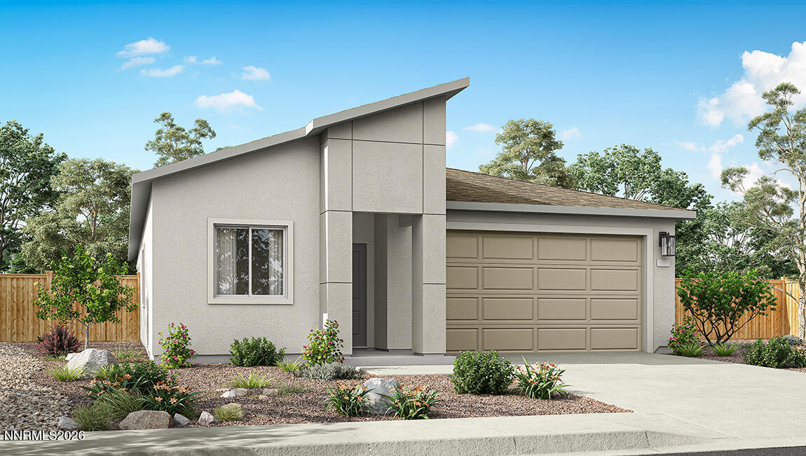 500 Daisy Fay Way Carson City, NV 89705 - Photo 1 of 22 a front view of a house with a yard and garage