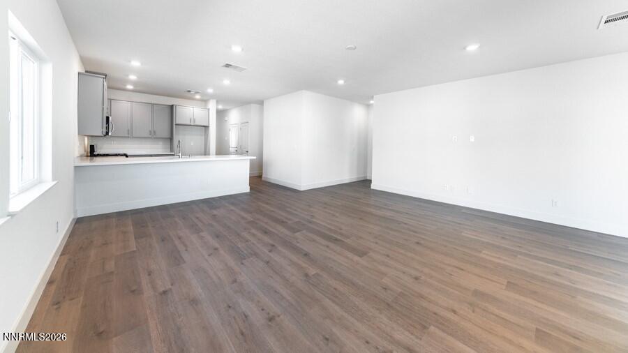 500 Daisy Fay Way Carson City, NV 89705 - Photo 11 of 22 a view of kitchen with kitchen island wooden floor center island and stainless steel appliances