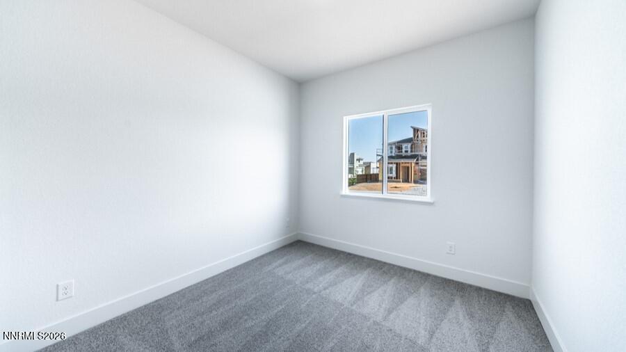 500 Daisy Fay Way Carson City, NV 89705 - Photo 3 of 22 a view of an empty room with a window