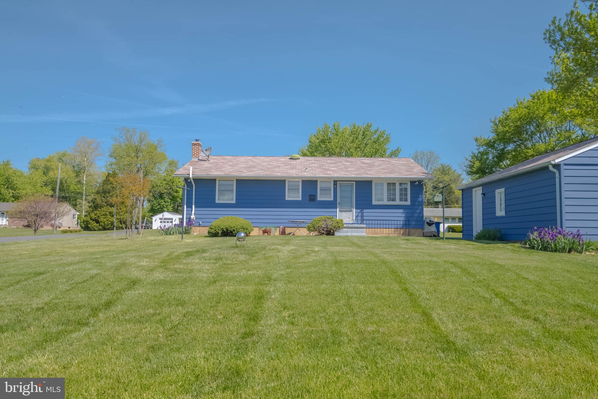 2319 Reckord Road Joppa, MD 21085 - Photo 35 of 45 a front view of a house with a garden