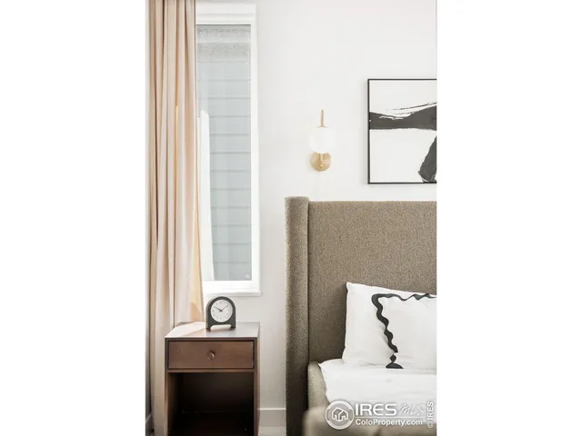 a bathroom with a sink a mirror and shower