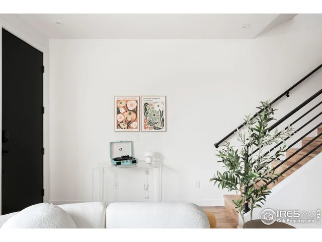 a open kitchen with stainless steel appliances kitchen island granite countertop a sink and cabinets