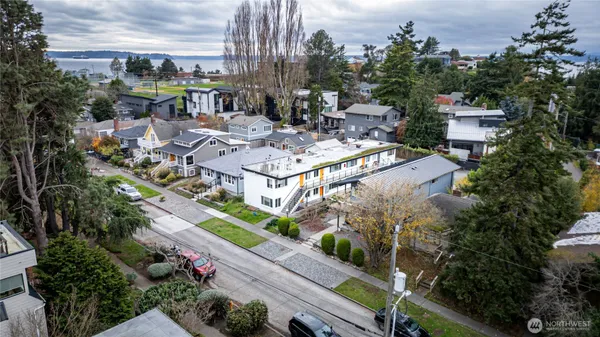 an aerial view of houses with outdoor space