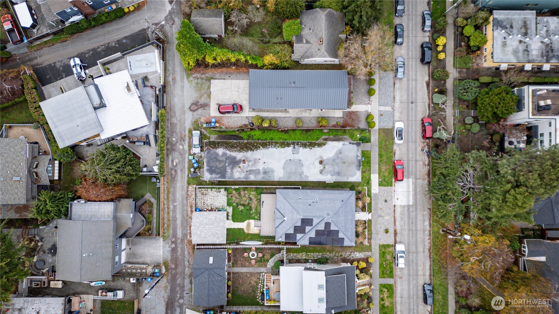 3035 64th Avenue Southwest Seattle, WA 98116 - Photo 6 of 14 an aerial view of houses with outdoor space