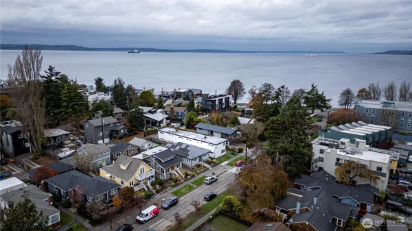 a kitchen with stainless steel appliances a refrigerator stove and microwave