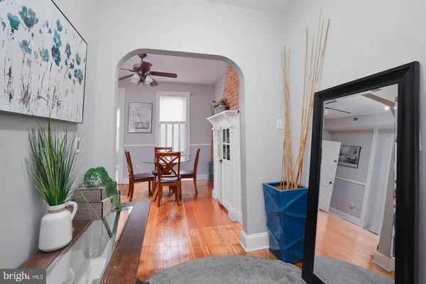 a kitchen with granite countertop cabinets stainless steel appliances and a sink
