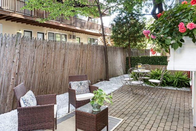 a front view of a house with patio
