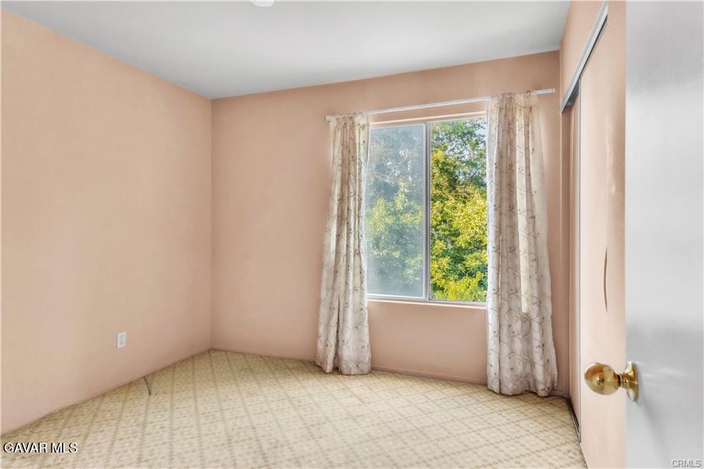 2309 Gregory Avenue Palmdale, CA 93550 - Photo 15 of 29 a view of an empty room with a window