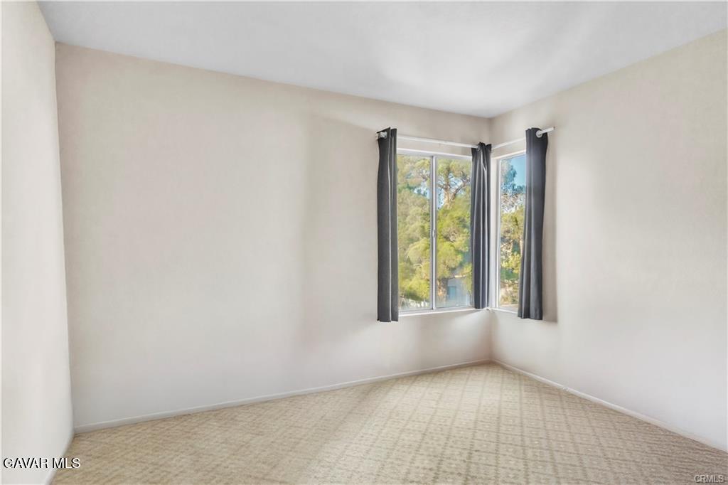 2309 Gregory Avenue Palmdale, CA 93550 - Photo 17 of 29 a view of an empty room with a window