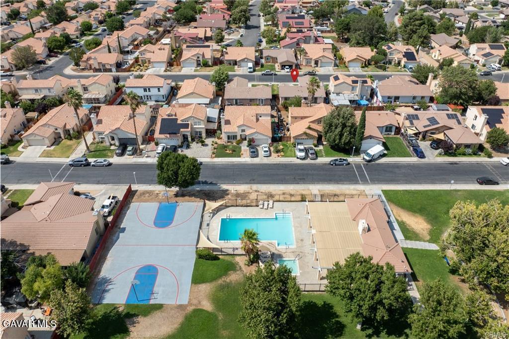 2309 Gregory Avenue Palmdale, CA 93550 - Photo 25 of 29 an aerial view of residential houses with outdoor space