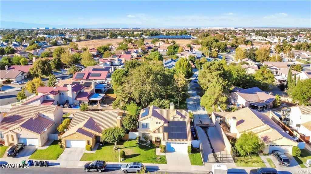 2309 Gregory Avenue Palmdale, CA 93550 - Photo 27 of 29 an aerial view of residential houses with outdoor space