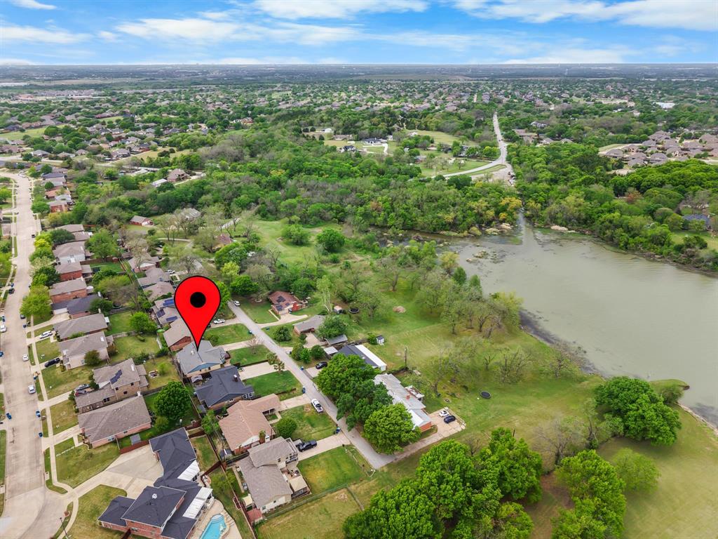 525 Pecan Lane Rowlett, TX 75089 - Photo 4 of 23 an aerial view of residential houses with outdoor space and lake view