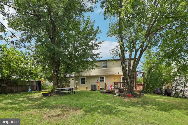 a view of a trees in front of a house