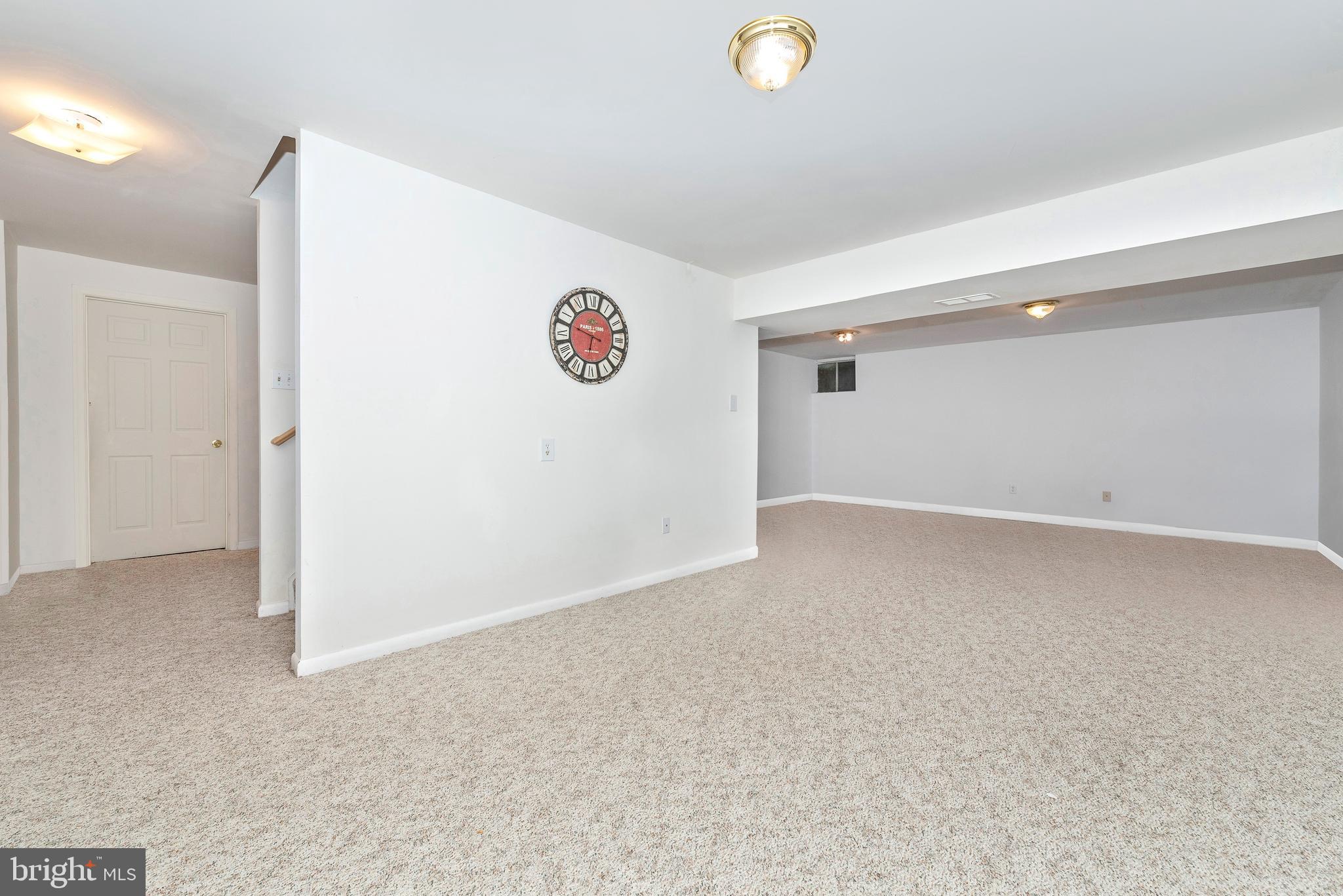 2511 Bear Den Road Frederick, MD 21701 - Photo 34 of 53 Finished lower level with storage area in back